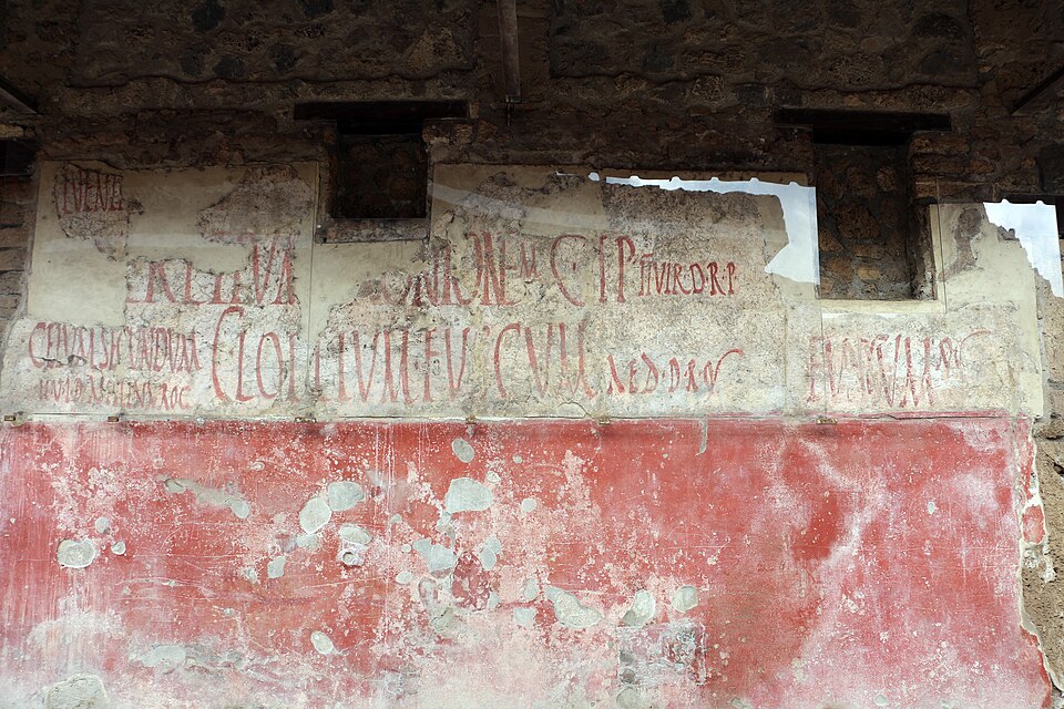 Pompei,_via_dell'abbondanza,_affreschi_e_iscrizioni